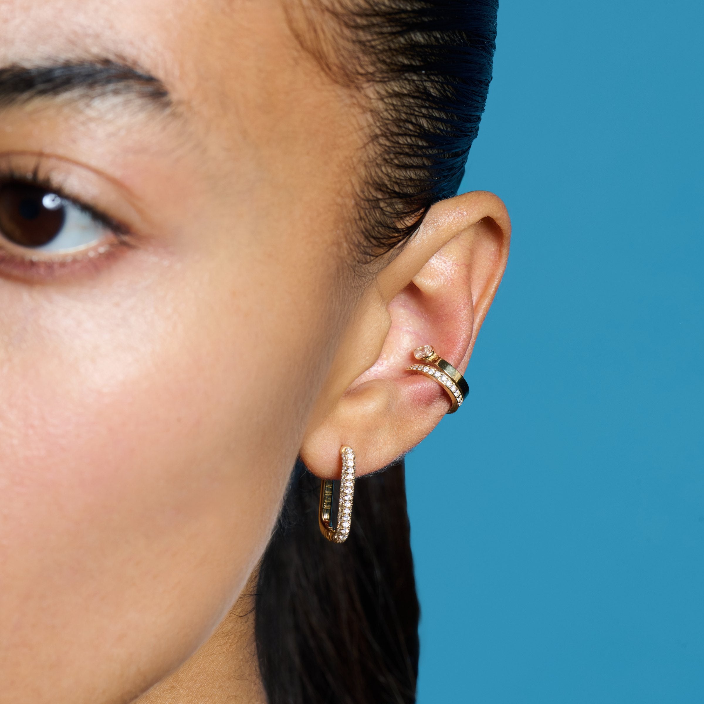 E’LHAA Nova pear bypass ear cuff in yellow gold, worn